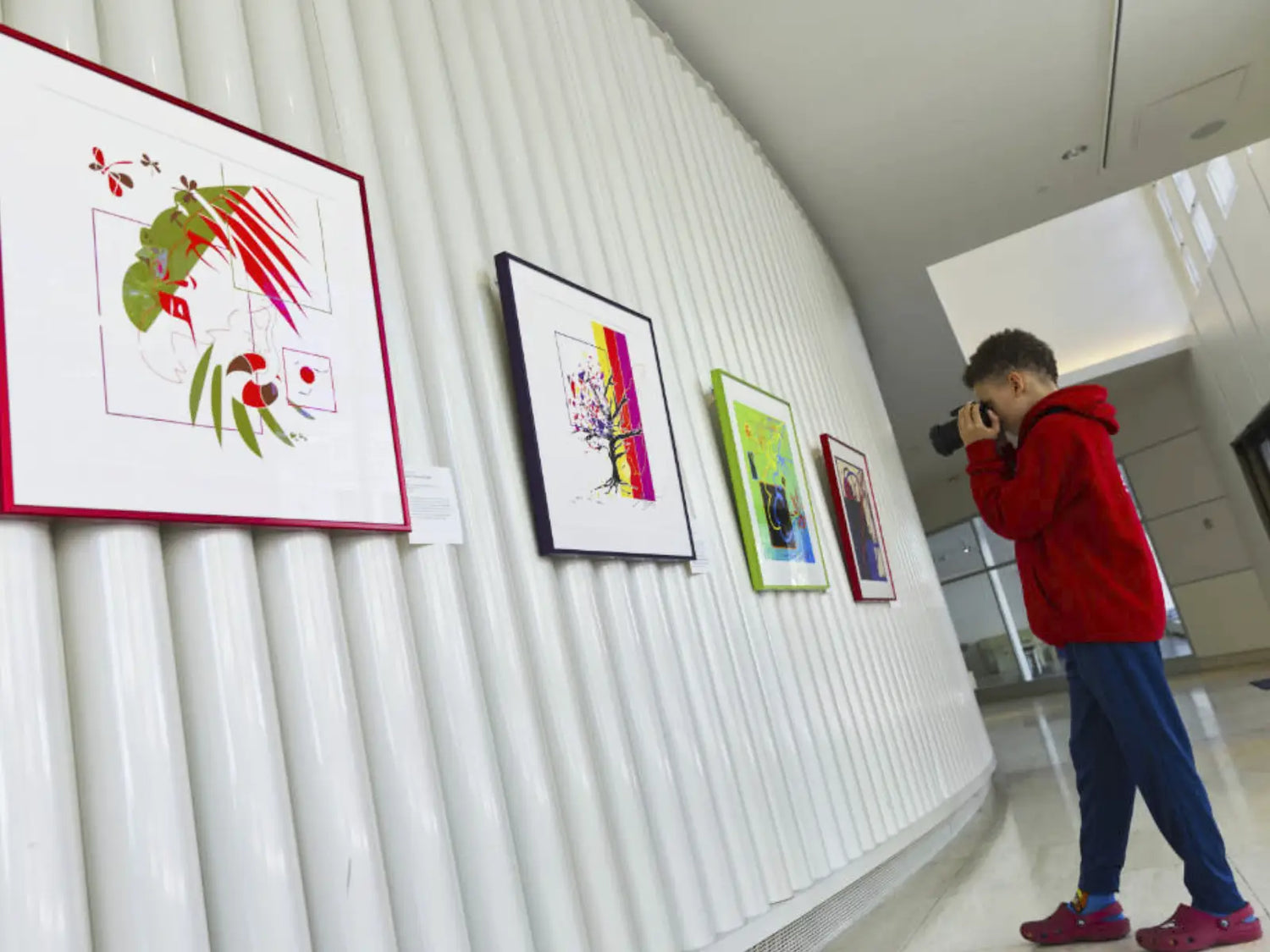 Artist reflecting on displaying artwork at the Overture Center alongside his boys