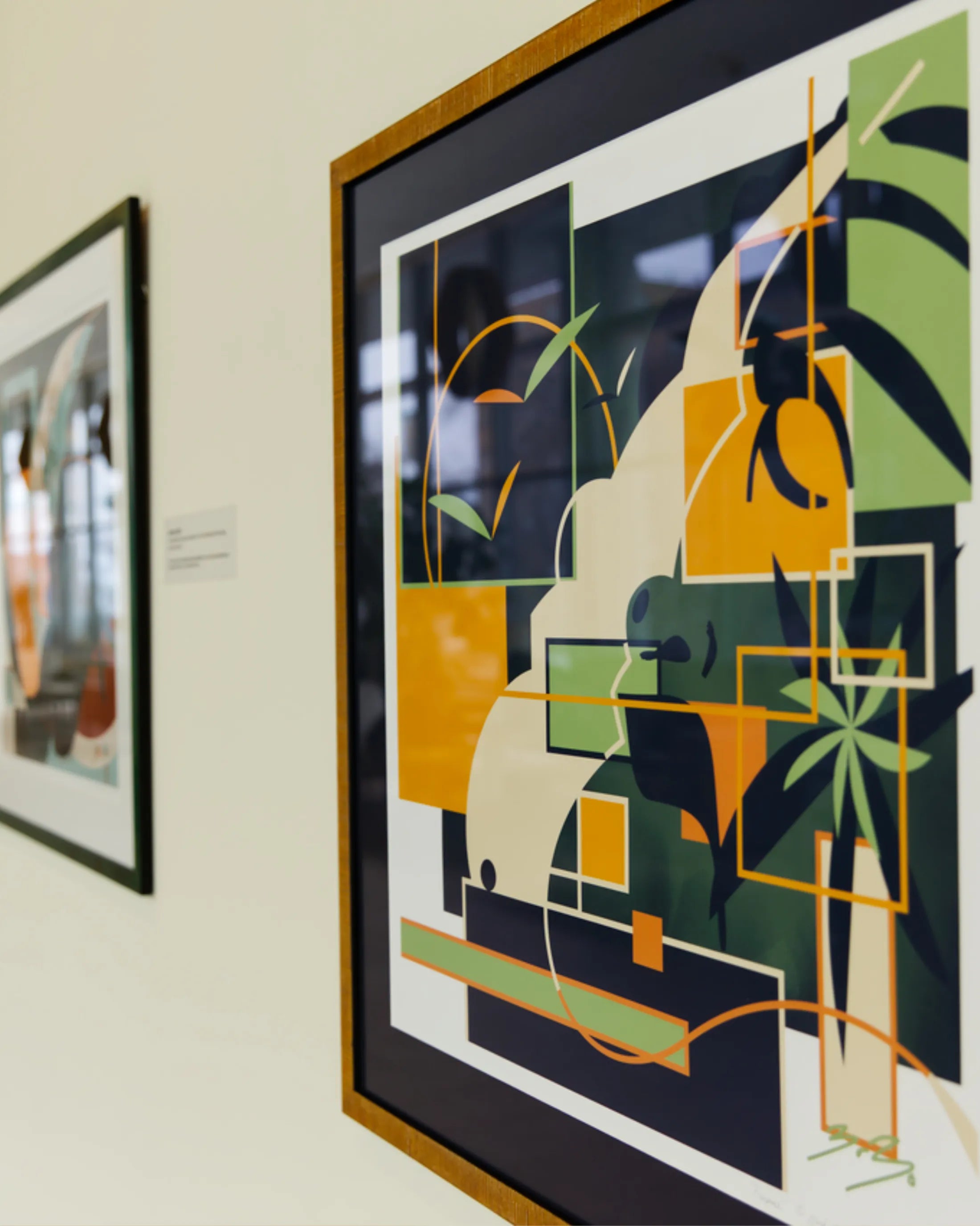 Framed art print close-up at an angle displayed at Saint John’s on the Lake gallery in Milwaukee