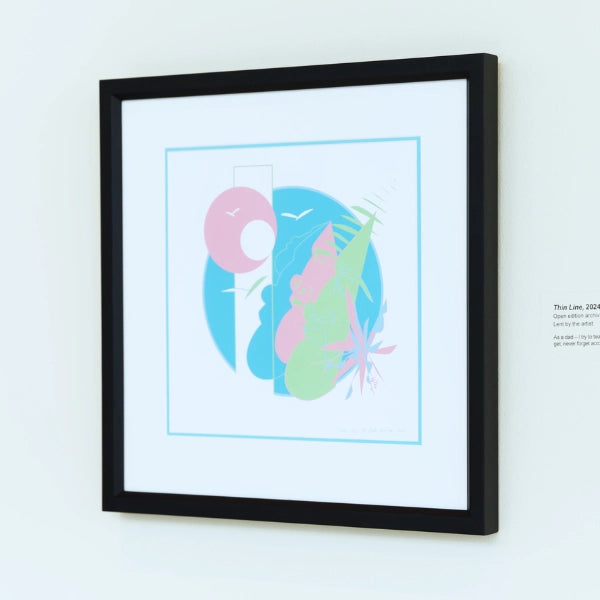 Framed artwork with abstract design on a white wall